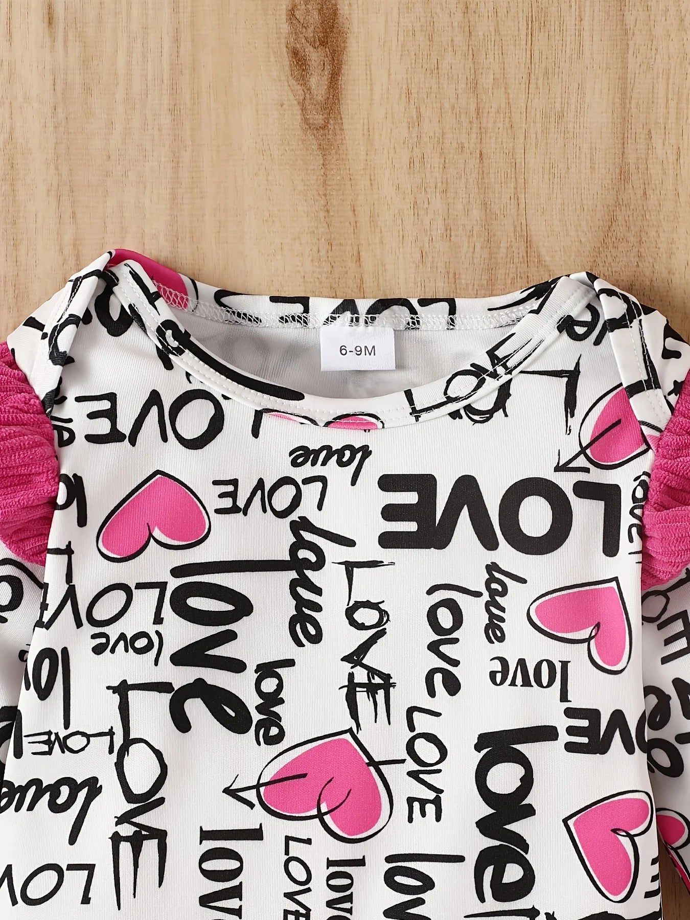 Valentine's Day baby girl's letter-print top, ribbed solid-color pants, paired with a bow, elastic and comfortable.